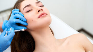 woman getting dermal filler at evolve med spa